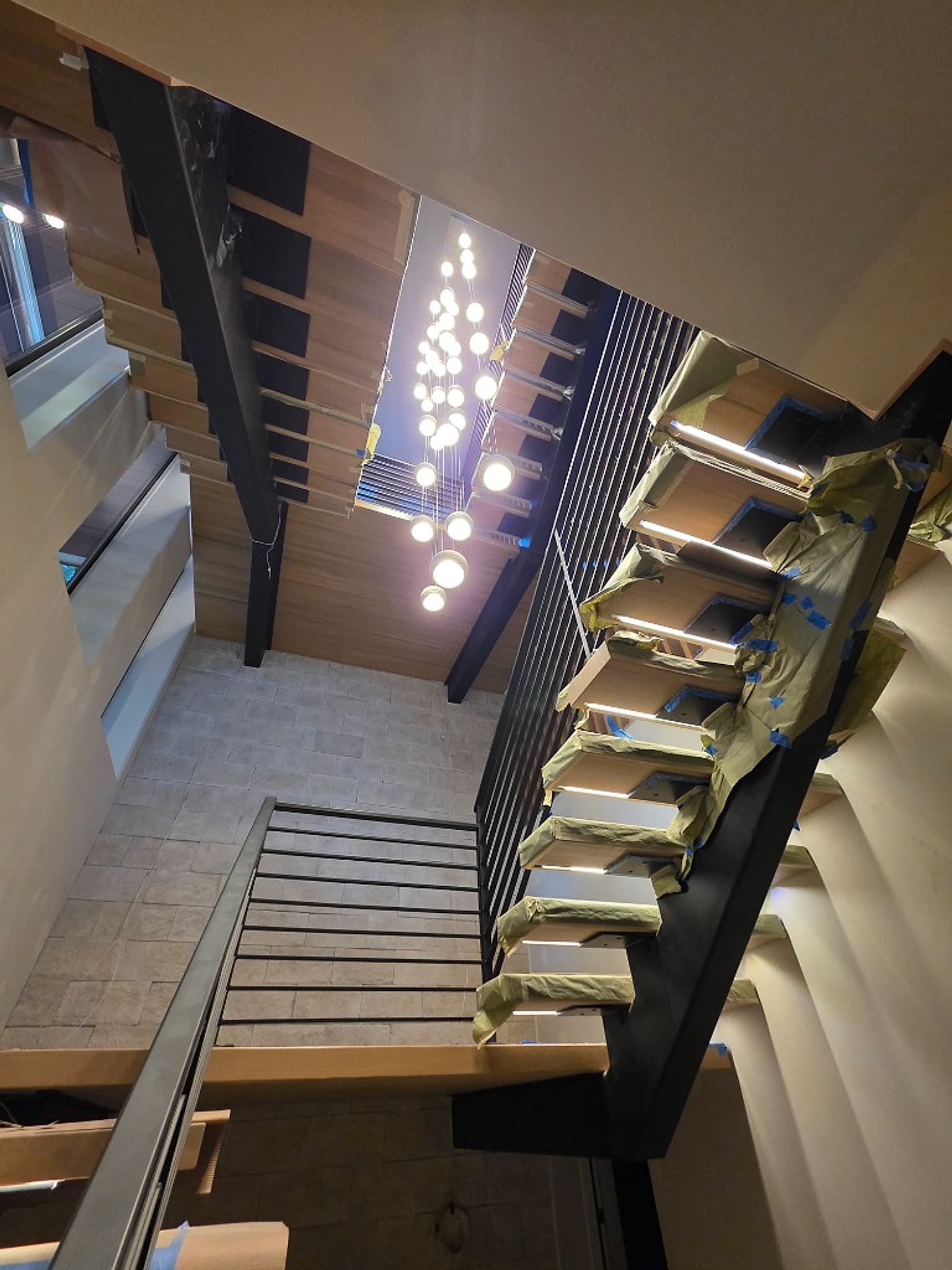 Floating Staircase Step Lighting & Cascading Chandelier
