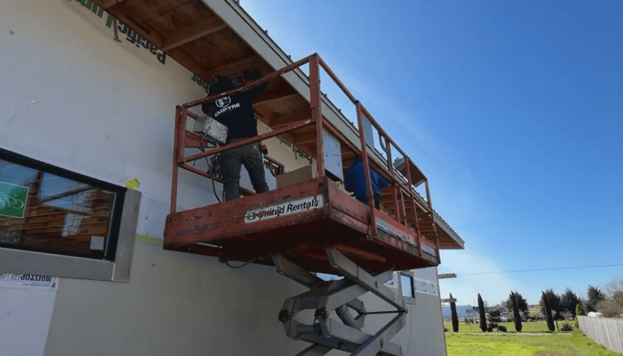 Empyre Electric electricians working on commercial installation